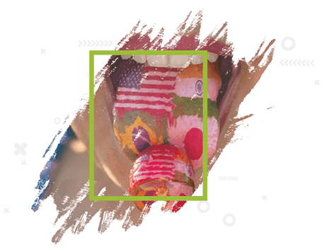 Imagen de una lengua lambiendo una paleta, la lengua tiene las banderas de USA, Brasil, Japón e india pintadas